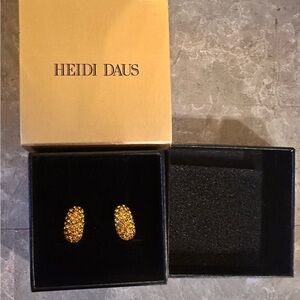 Authentic crystal Heidi Daus clip on earrings, color sun